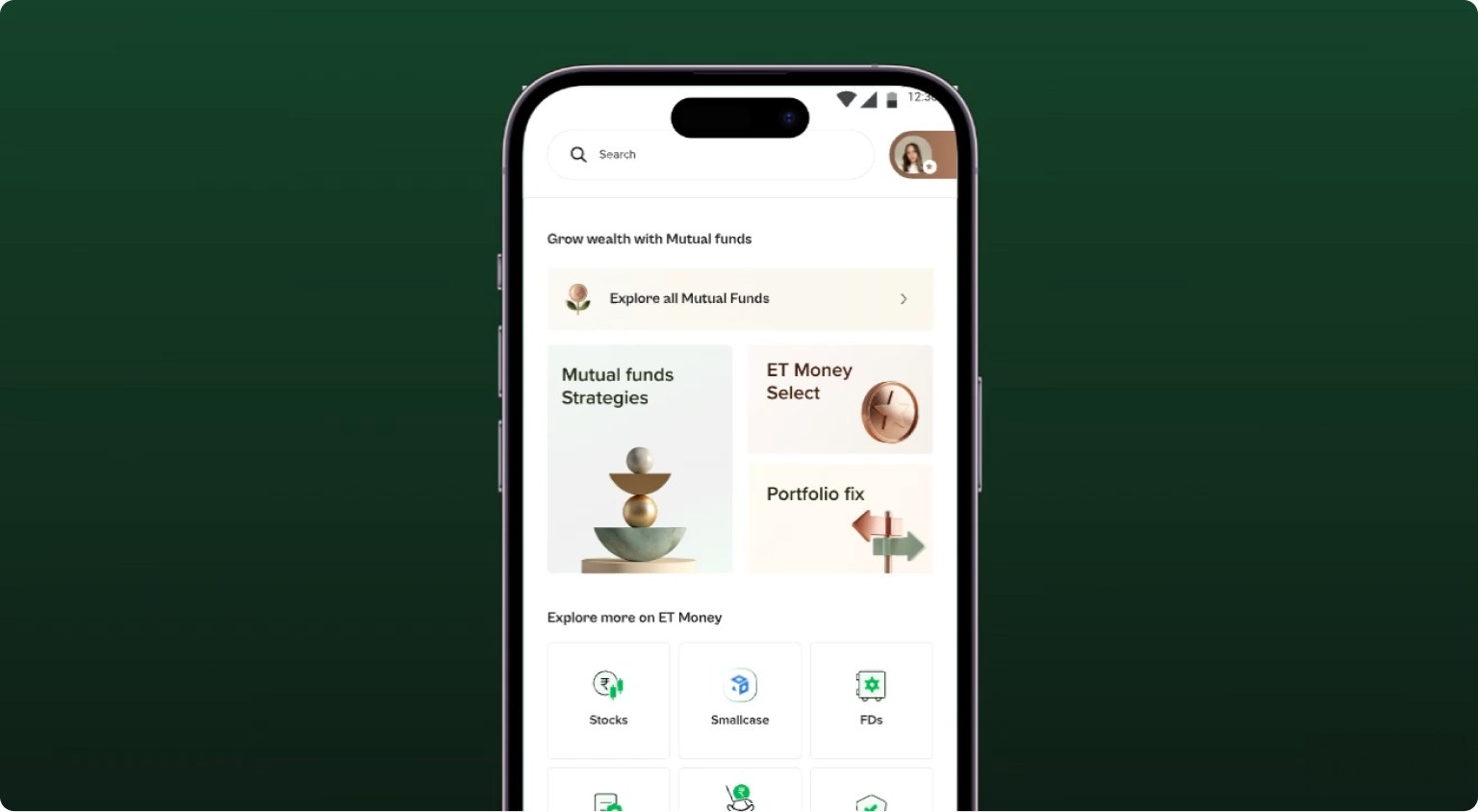 The redesigned ET Money home screen on a phone, over a dark green cover